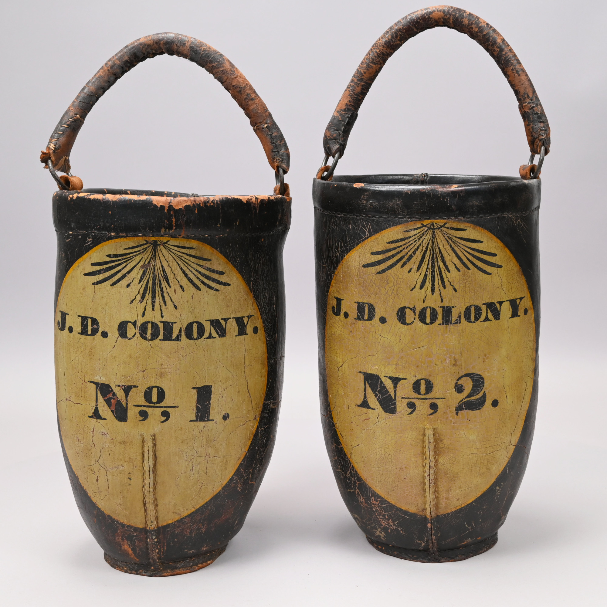 Pair of New Hampshire Painted Leather Fire Buckets, J.D. Colony, Keene, 1820-1840
